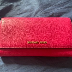 Michael kors pebbled leather wallet. Pink